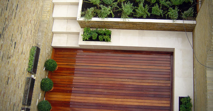 Nice new polished decking and limestone steps to replace the brick